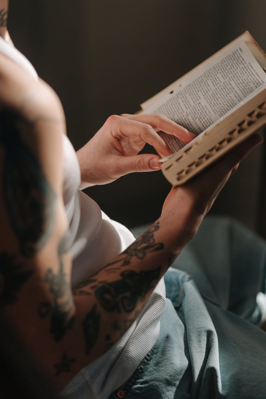 close up shot of a person reading a bible